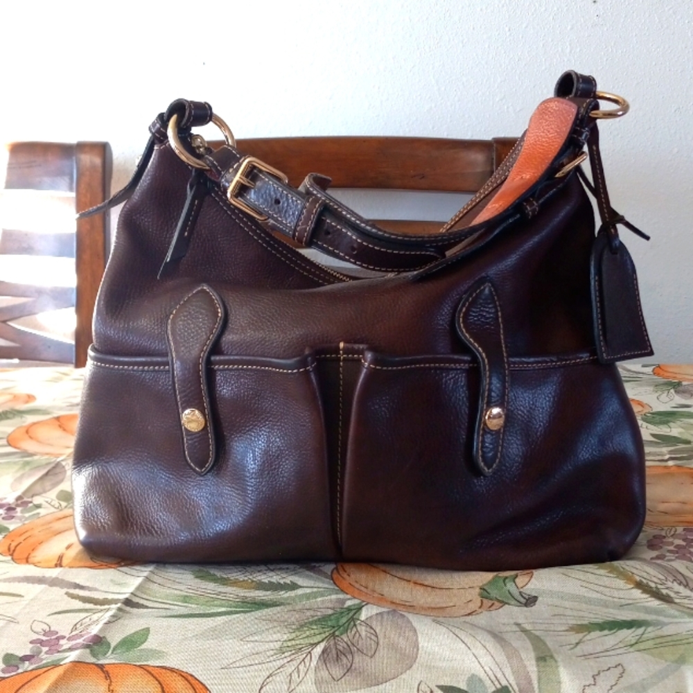 Vintage Leather Dooney & Bourke Dark  Brown Florentine Vacchetta Lucy Hobo Bag.
